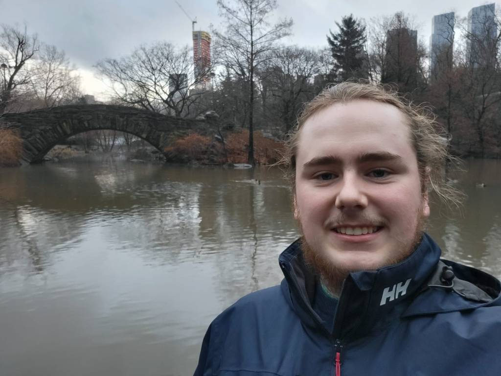 In this picture Seán can be seen smiling at the camera, with the NYC Central Park in background.